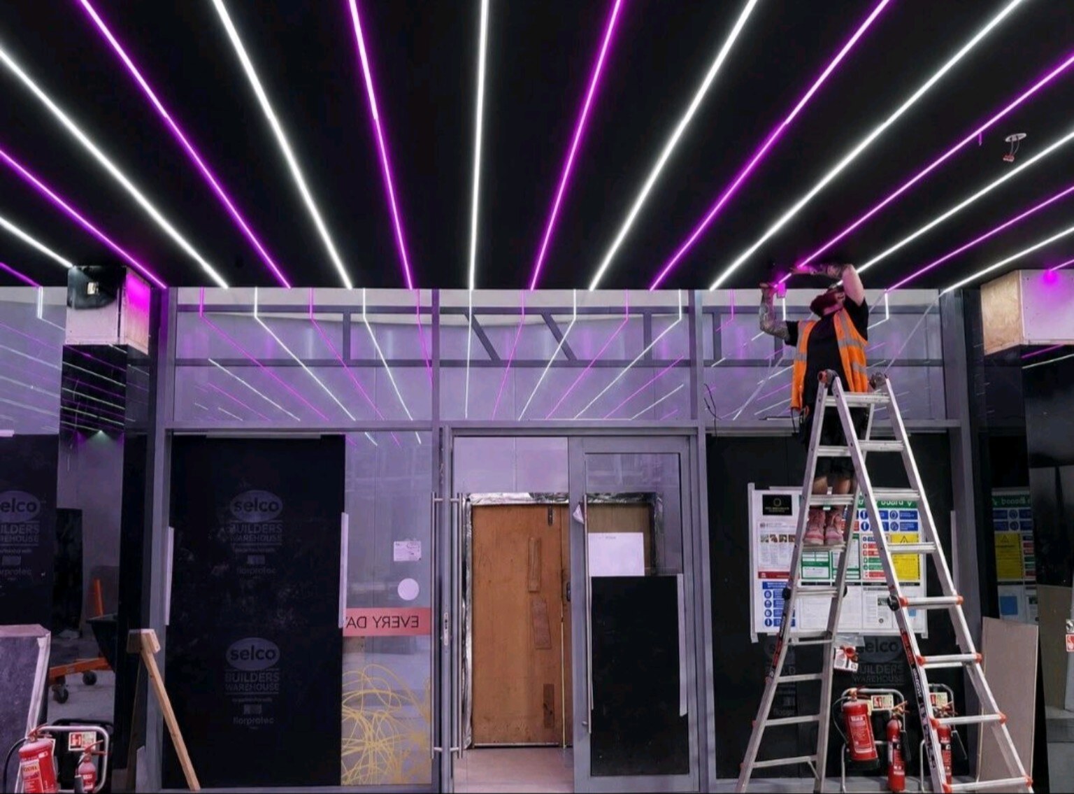 LED ceiling installation during the Rassam's Creamery fit-out